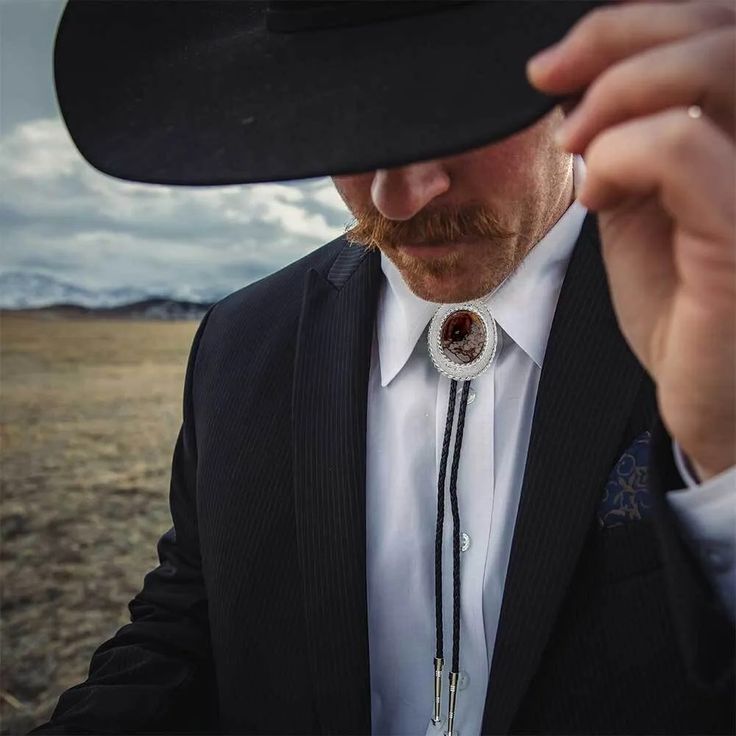 How to Wear a Bolo Tie: 5 Tips for Perfecting Your Style 3 Wild Horse Bolo Tie: Rustic and Unique