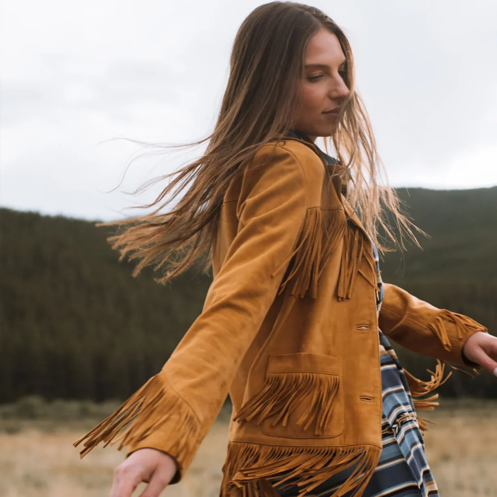 What Should I Wear To a Country Concert Outfit? 10 women wearing fringe jacket